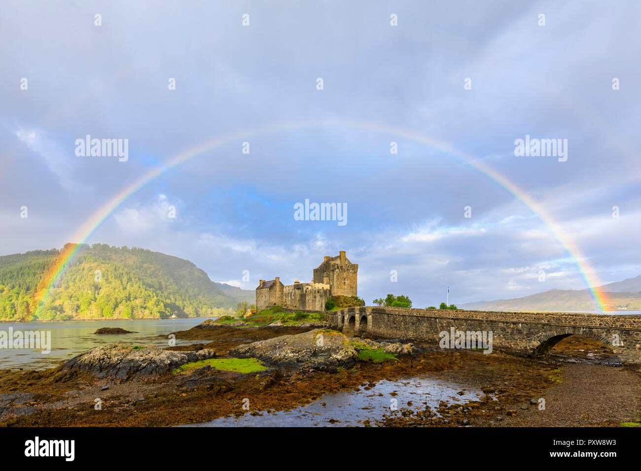 UK, Scotland, Dornie, Loch Duich, Eilean Donan Castle with rainbow Stock Photo