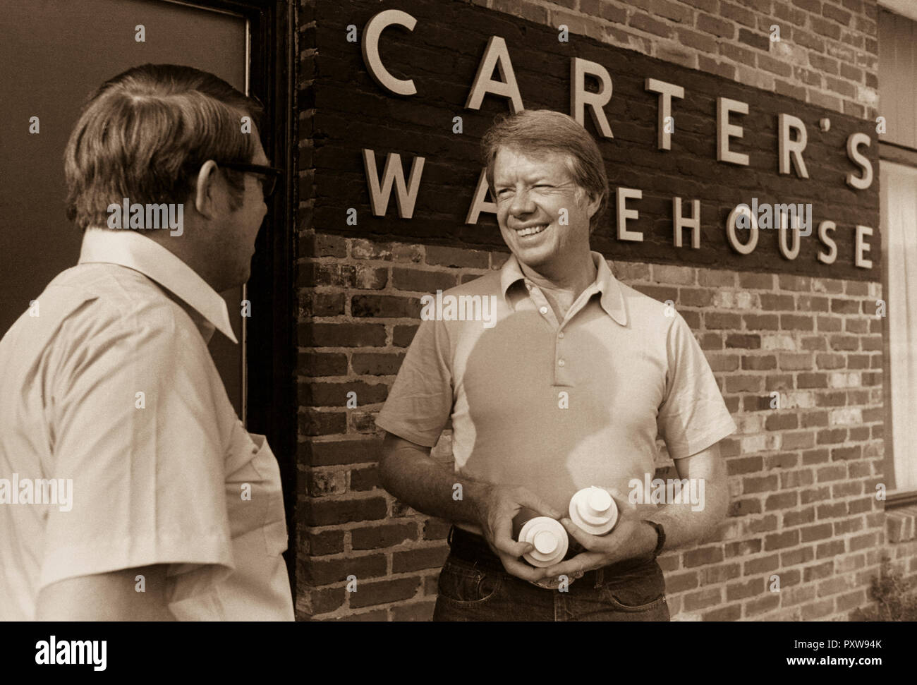 Jimmy Carter and his brother Billy outside the office of the family  business - Carter's Warehouse - in Plains, Georgia Stock Photo - Alamy