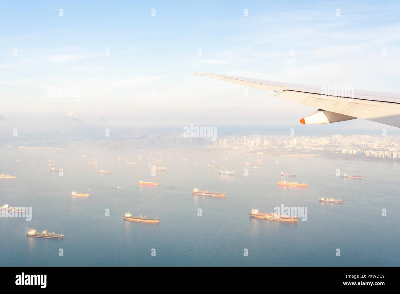 Indonesia, Bali, wing of an airplane above the sea Stock Photo