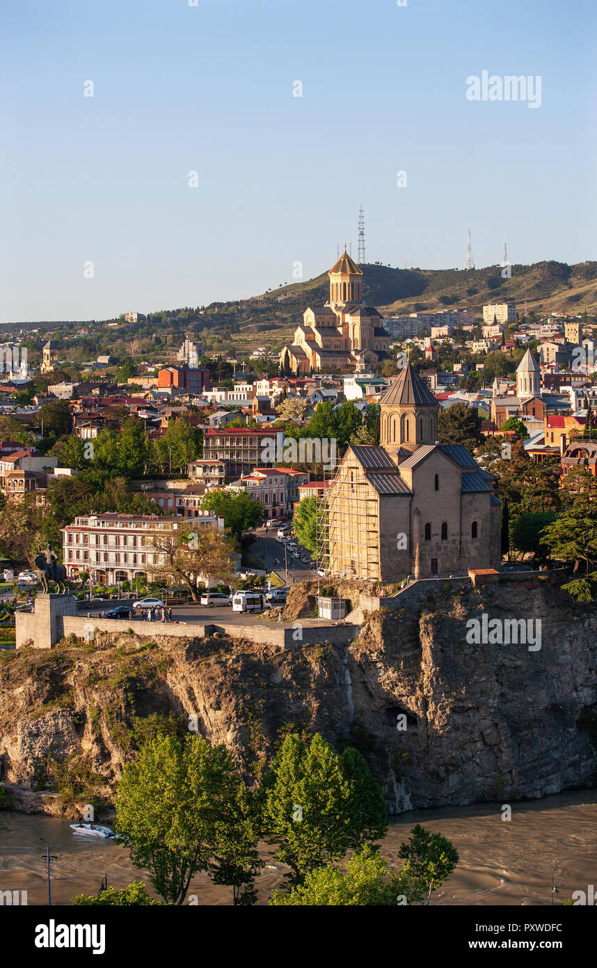 Georgia, Tbilisi, Kura river and Sameba Cathedral in old town Stock Photo