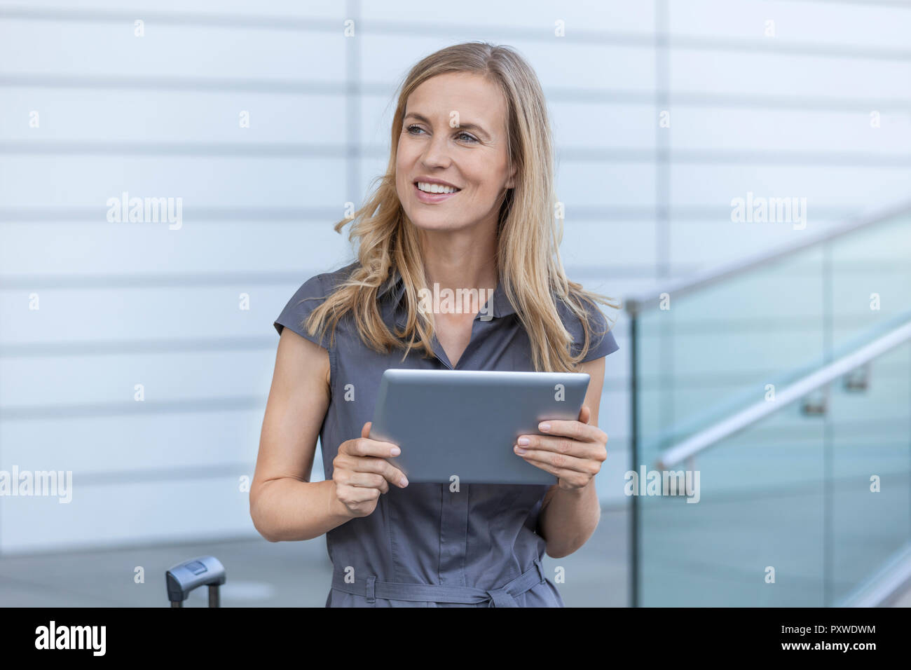 Smiling blond businesswoman Stock Photo