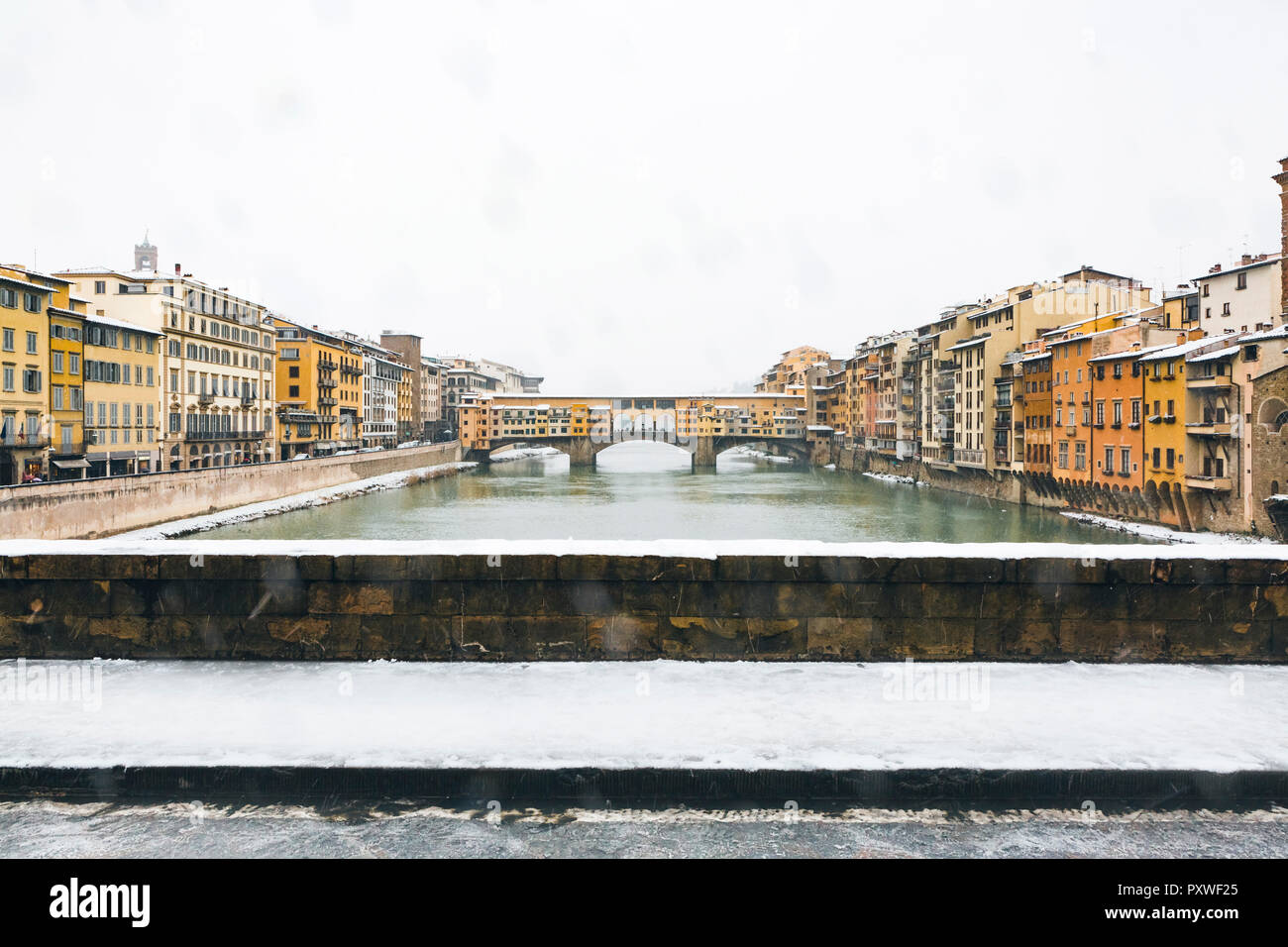 Italy, Florence, view to Ponte Vecchio on a snowy day Stock Photo