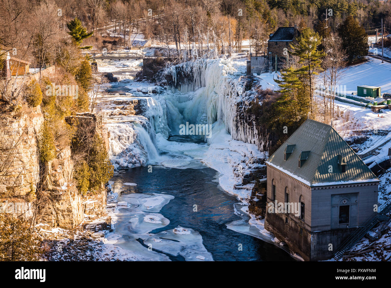 Snow and icicles cover Ausable Chasm, a 2 mile gorge in the Adirondacks of Upstate New York known as the Grand Canyon of the East. Stock Photo