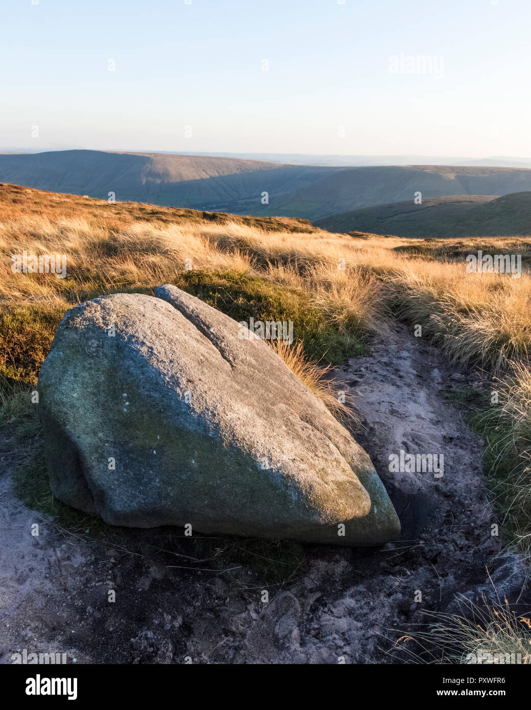 Peak District landscape. Gritstone rock and a view from the southern edge of Kinder Scout in early Autumn, Derbyshire, England, UK Stock Photo