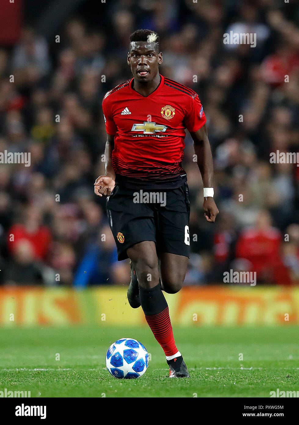 Manchester United's Paul Pogba during the UEFA Champions League match at Old Trafford, Manchester. PRESS ASSOCIATION Photo. Picture date: Tuesday October 23, 2018. See PA story SOCCER Man Utd. Photo credit should read: Martin Rickett/PA Wire Stock Photo