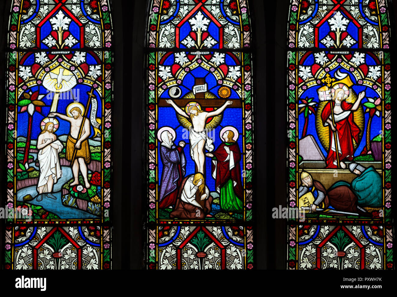 The East Window depicting the life of Christ, St. John the Baptist Church, Brinklow, Warwickshire, England, UK Stock Photo