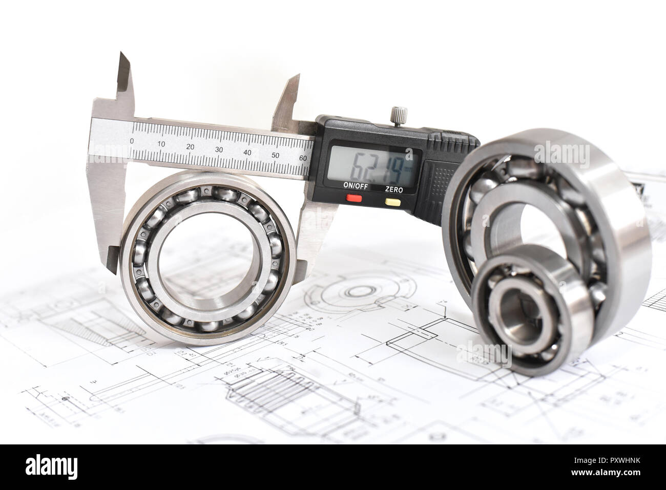 Quality control in modern mechanical engineering caliper gauges, technical drawing and ball