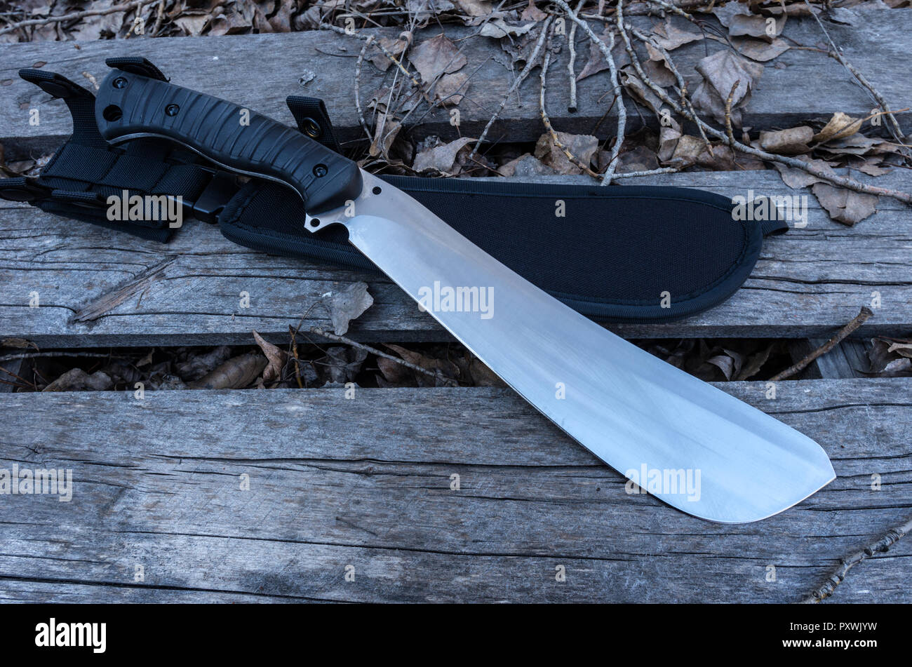 A machete knife with scabbard. View down Stock Photo Alamy