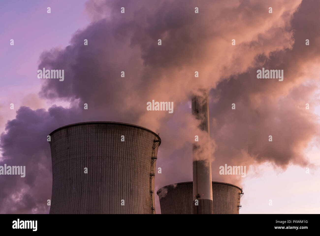 Lignite-fired power plant Neurath, NRW, Germany with moon at dusk Stock Photo