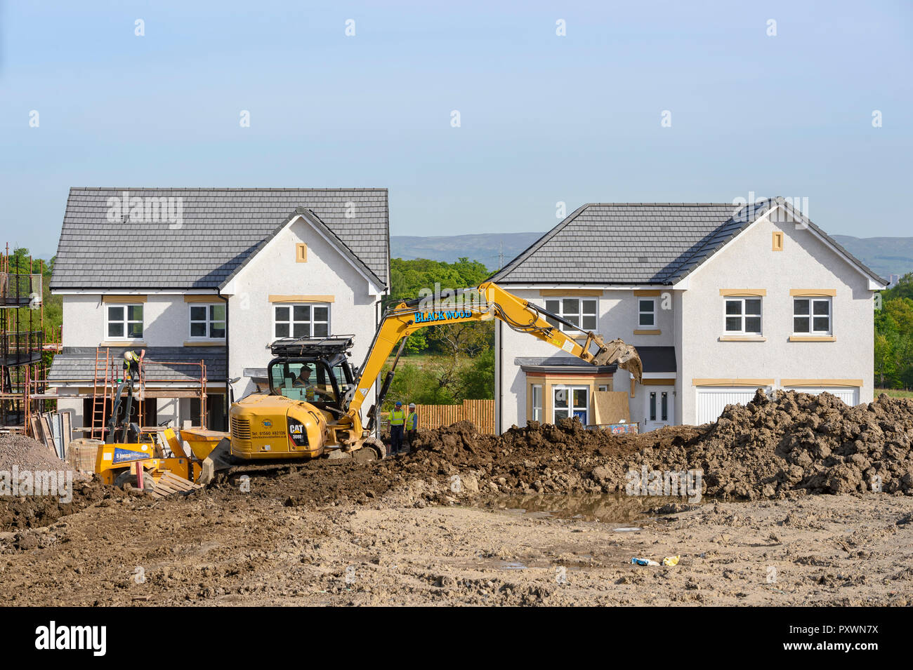 Building and construction work at a new housing development. Stock Photo