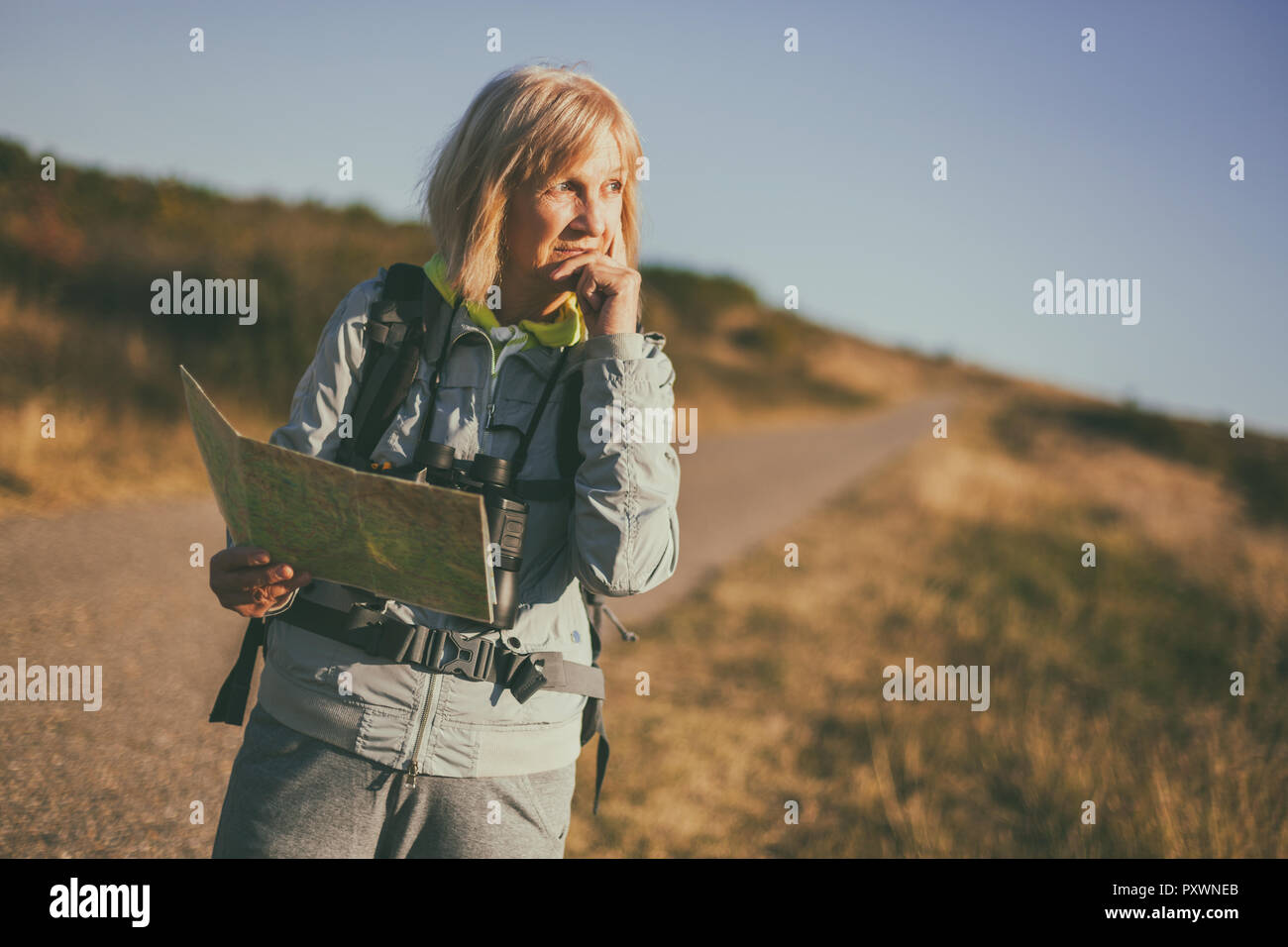 Senior woman thinking outdoor hi-res stock photography and images - Alamy