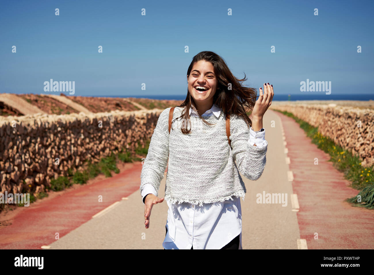 Happy young brunette woman outdoor Stock Photo