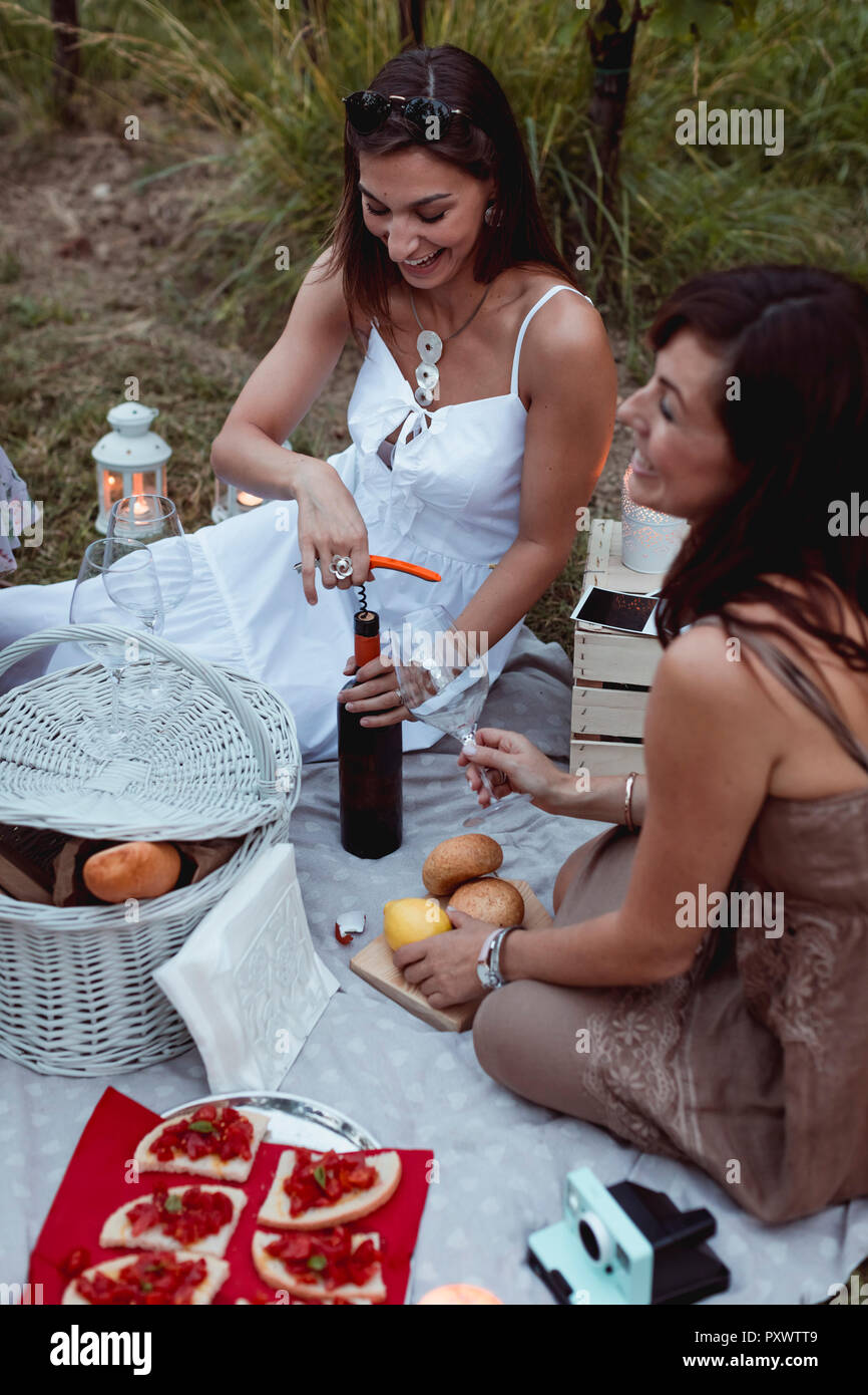 Two girls having a picnic hi-res stock photography and images - Alamy