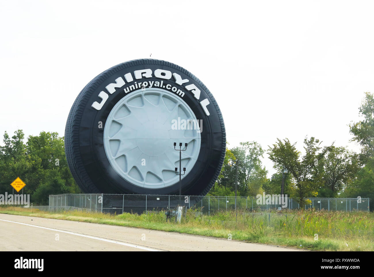 Giant Uniroyal tyre on the approach to Motor City, Detroit, Michigan, USA Stock Photo