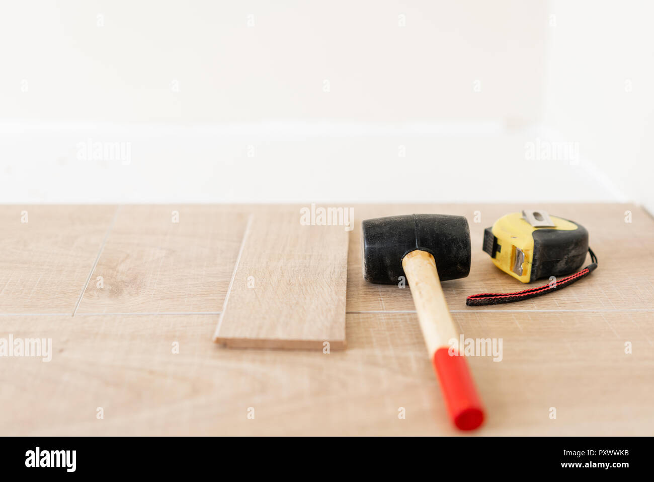 Installing Laminate Parquet In Interior On The Floor Lie