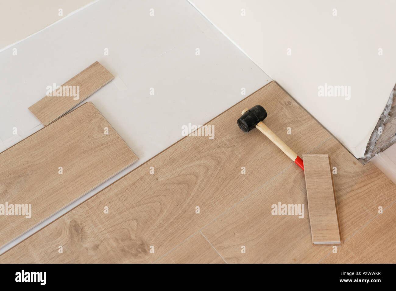 Installing Laminate Parquet In Interior On The Floor Lie