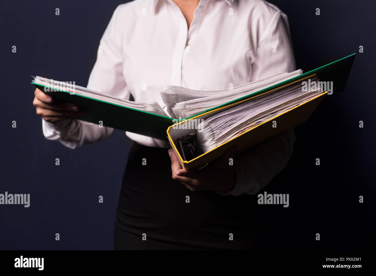 Portrait of young happy smiling business woman with folder Stock Photo ...