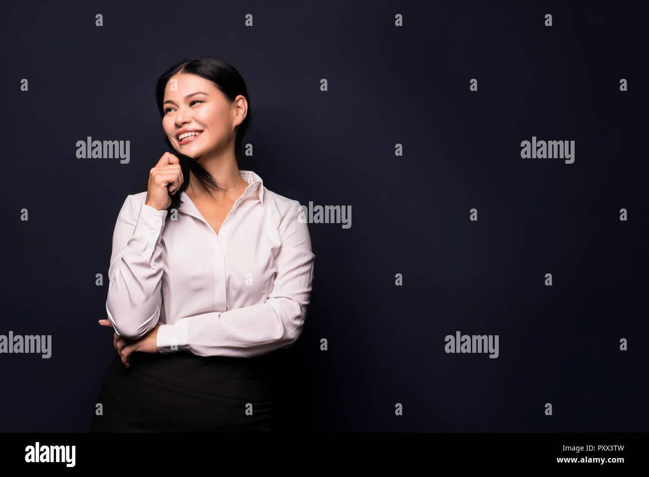 Happy smiling beautiful young business woman Stock Photo - Alamy