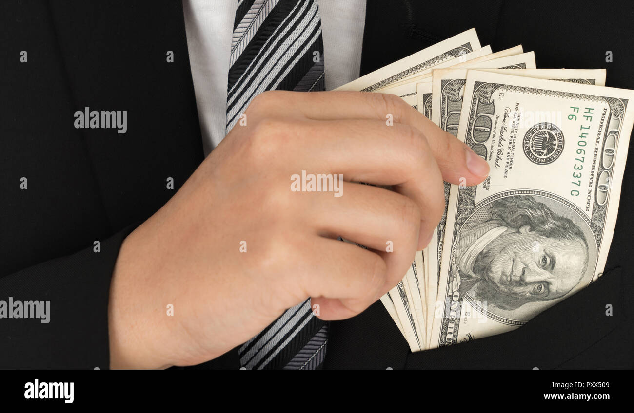 Business man Displaying a Spread of Dollar Stock Photo - Alamy