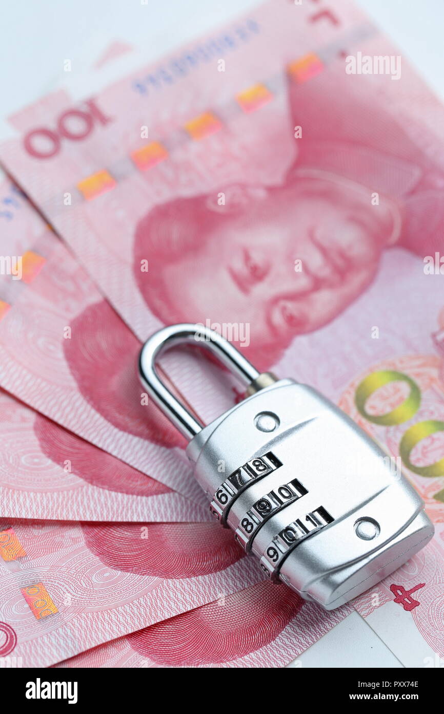 Financial security concept Password lock and banknotes on white ...