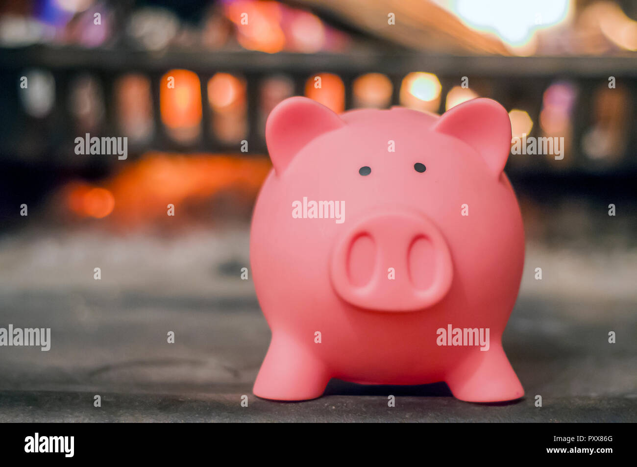 Savings Concept Piggy Bank With Fireplace Energy Saving Concept