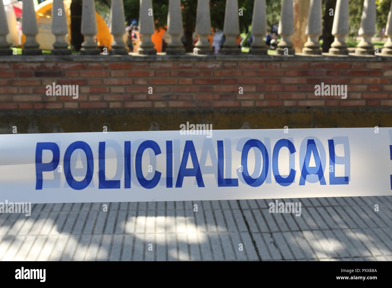 A Spanish police white and blue tape with the Local Stock Photo