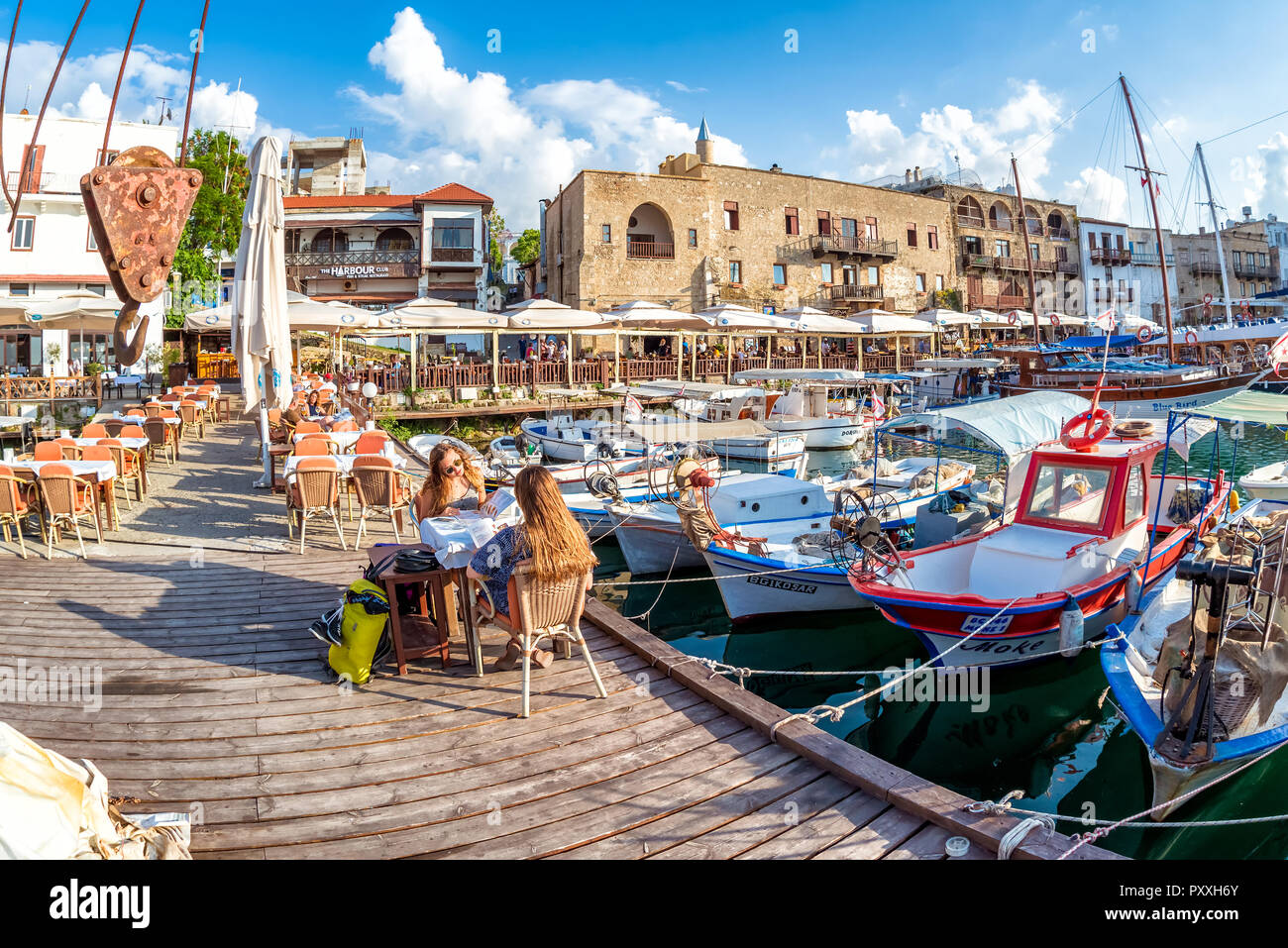 KYRENIA, CYPRUS - MAY 11, 2018: Cafe on the pier of Kyrenia Old Town. Stock Photo