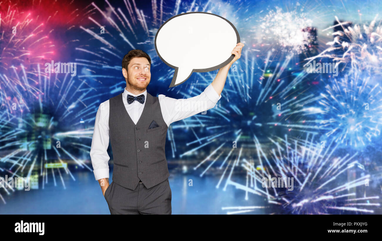 man in suit with blank text bubble over firework Stock Photo