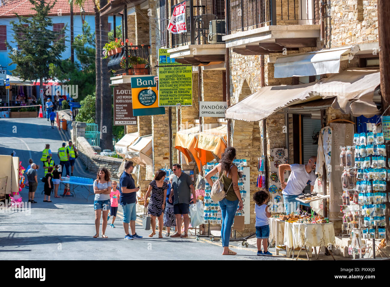 PANO LEFKARA, CYPRUS - JUNE 17, 2018: Scenic street view with many tourists in Lefkara village. Stock Photo
