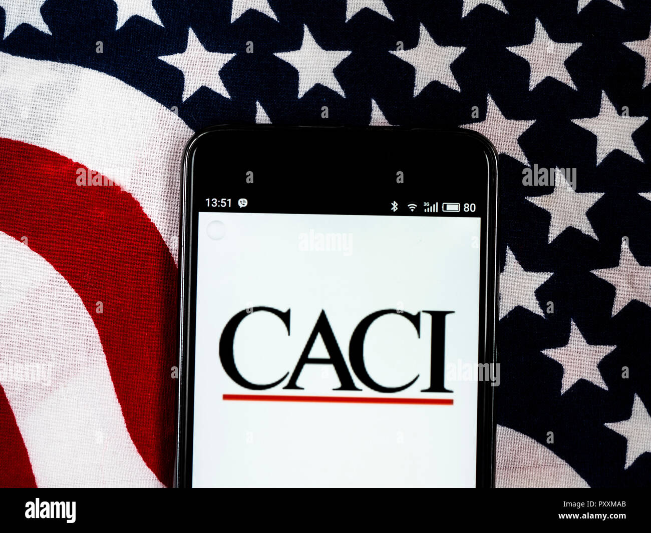 CACI Information technology company logo seen displayed on smart phone.. CACI International Inc is an American multinational professional services and information technology company headquartered in Arlington, Virginia. CACI provides services to many branches of the federal government including defense, homeland security, intelligence, and healthcare. Stock Photo