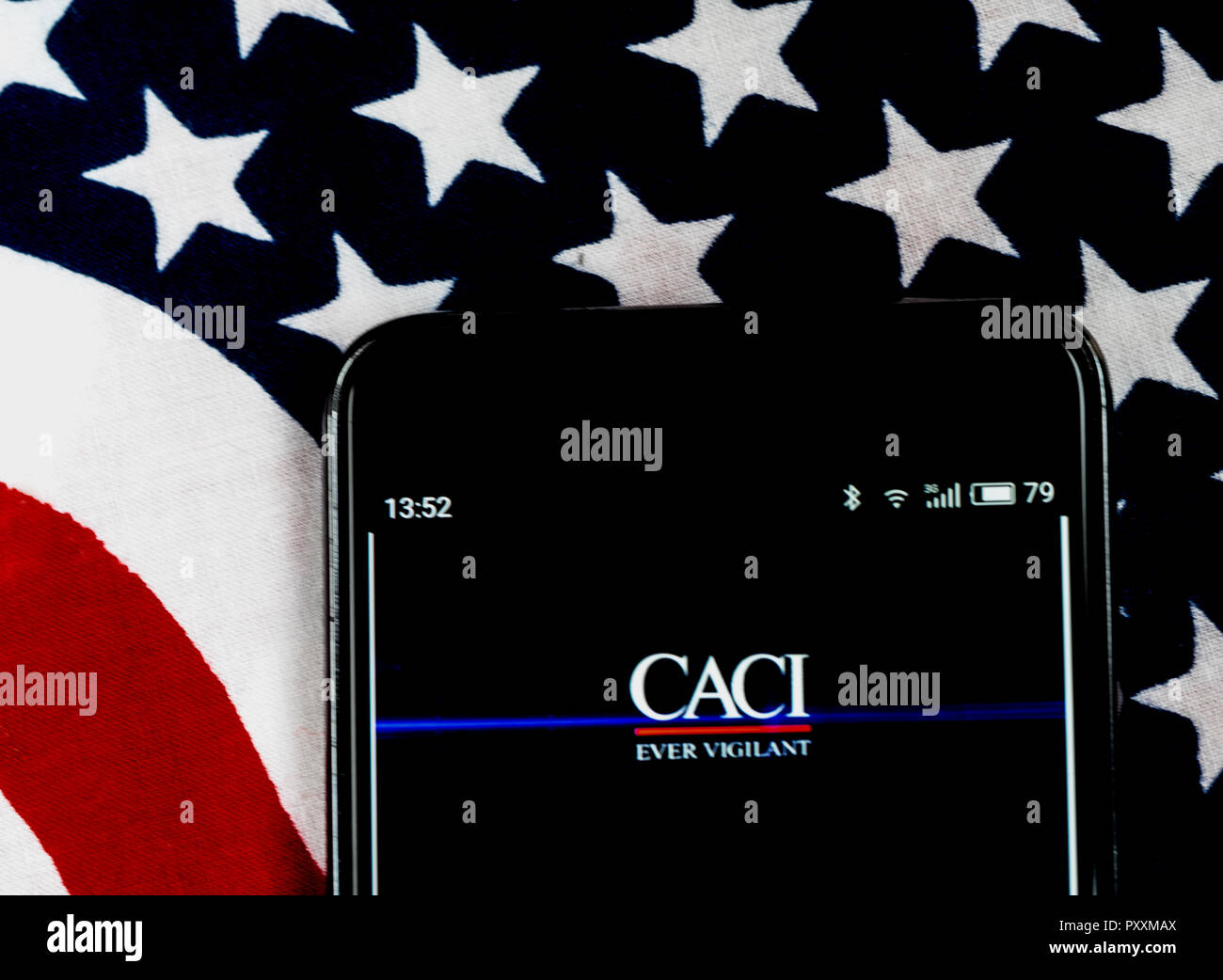 CACI Information technology company logo seen displayed on smart phone.. CACI International Inc is an American multinational professional services and information technology company headquartered in Arlington, Virginia. CACI provides services to many branches of the federal government including defense, homeland security, intelligence, and healthcare. Stock Photo