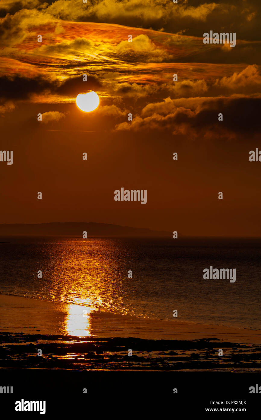 A streak of sunlight going across the sea Stock Photo Alamy