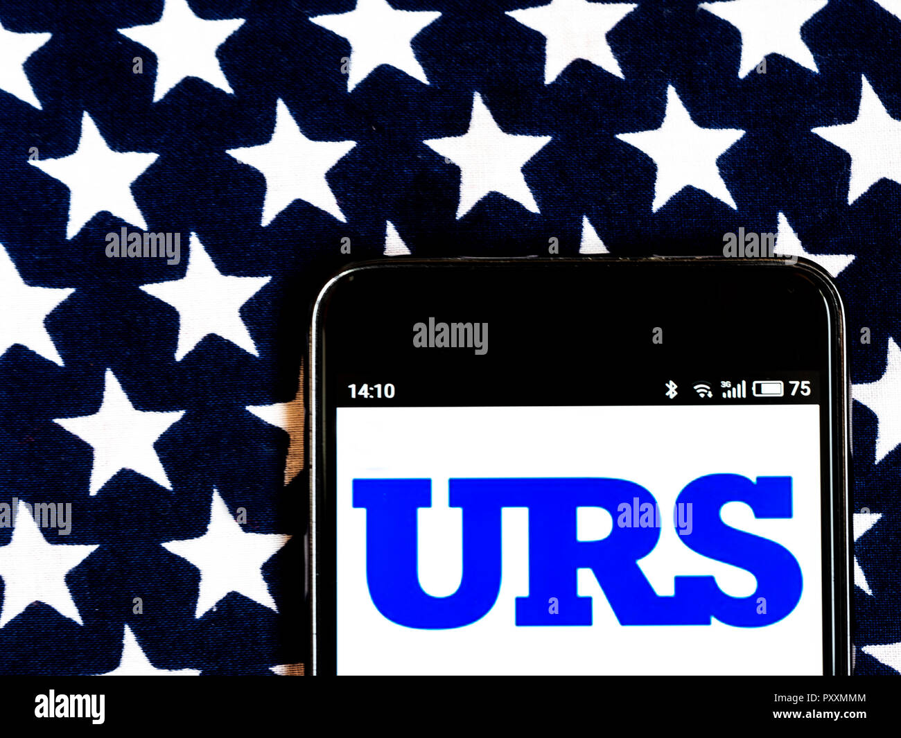URS Corporation Engineering and design company  logo seen displayed on smart phone. URS Corporation was an engineering, design, and construction firm and a U.S. federal government contractor. Headquartered in San Francisco, California, URS was a full-service, global organization with offices located in the Americas, Europe, Africa, and Asia-Pacific. Stock Photo