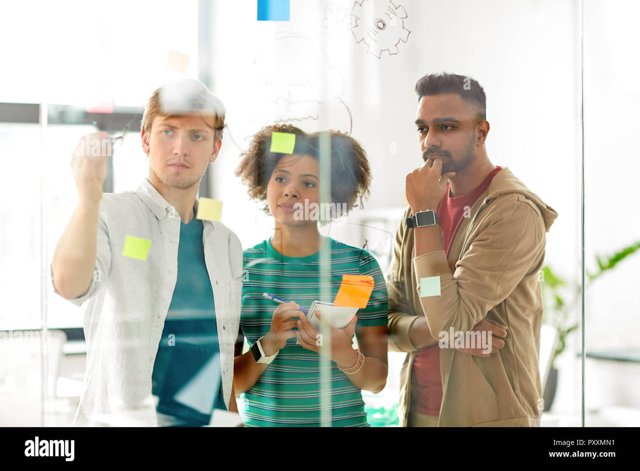creative team working with glass board at office Stock Photo