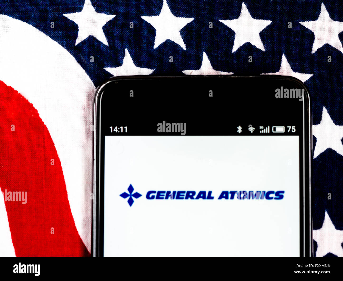 General Atomics Defense contractor company logo seen displayed on smart phone. General Atomics is a defense contractor headquartered in San Diego, California, specializing in nuclear physics including nuclear fission and nuclear fusion. Stock Photo