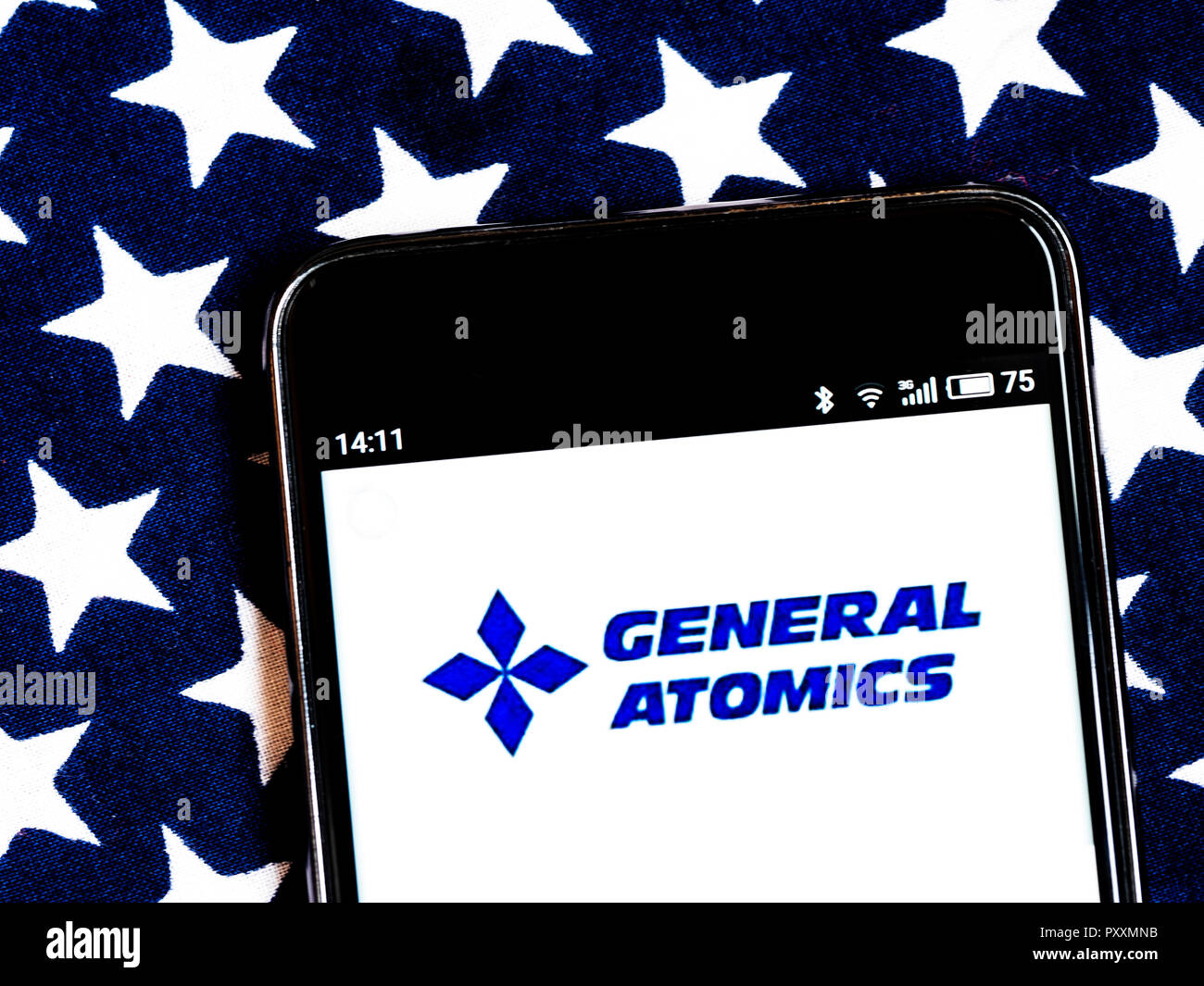 General Atomics Defense contractor company logo seen displayed on smart phone. General Atomics is a defense contractor headquartered in San Diego, California, specializing in nuclear physics including nuclear fission and nuclear fusion. Stock Photo