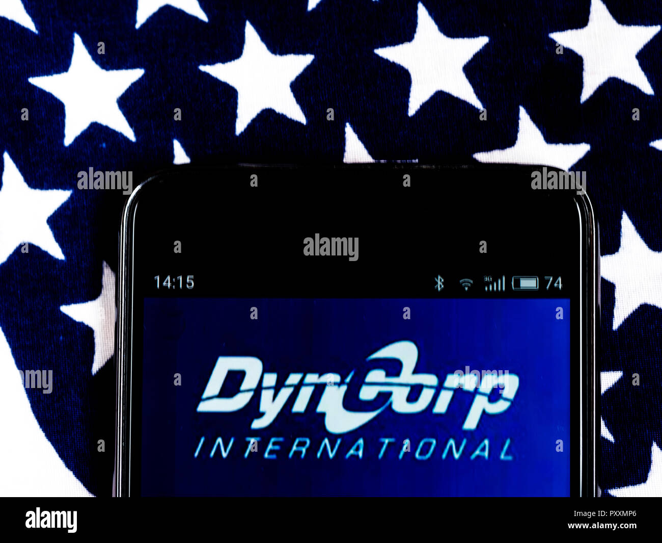 DynCorp Company logo seen displayed on smart phone. DynCorp, most recently DynCorp International, is an American Global service provider. Started as an aviation company, the company also provides flight operations support, training and mentoring, Stock Photo