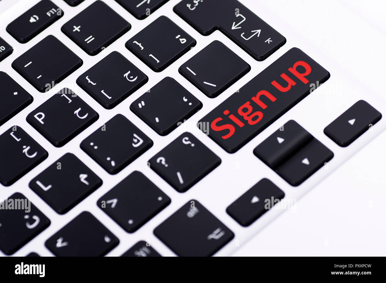 Signup on keyboard button Stock Photo
