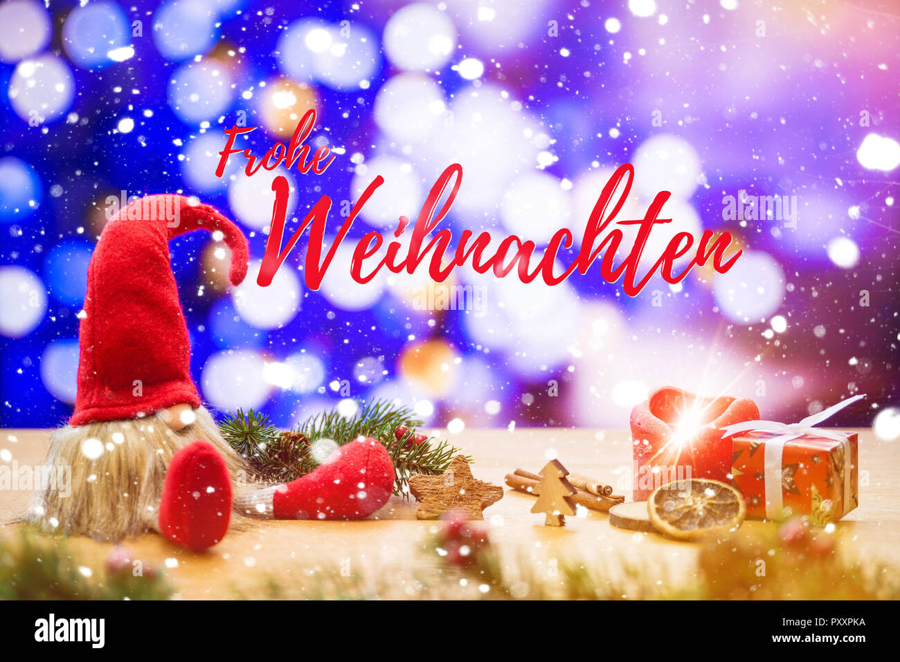 Red sitting christmas elf in falling snow with german writing frohe