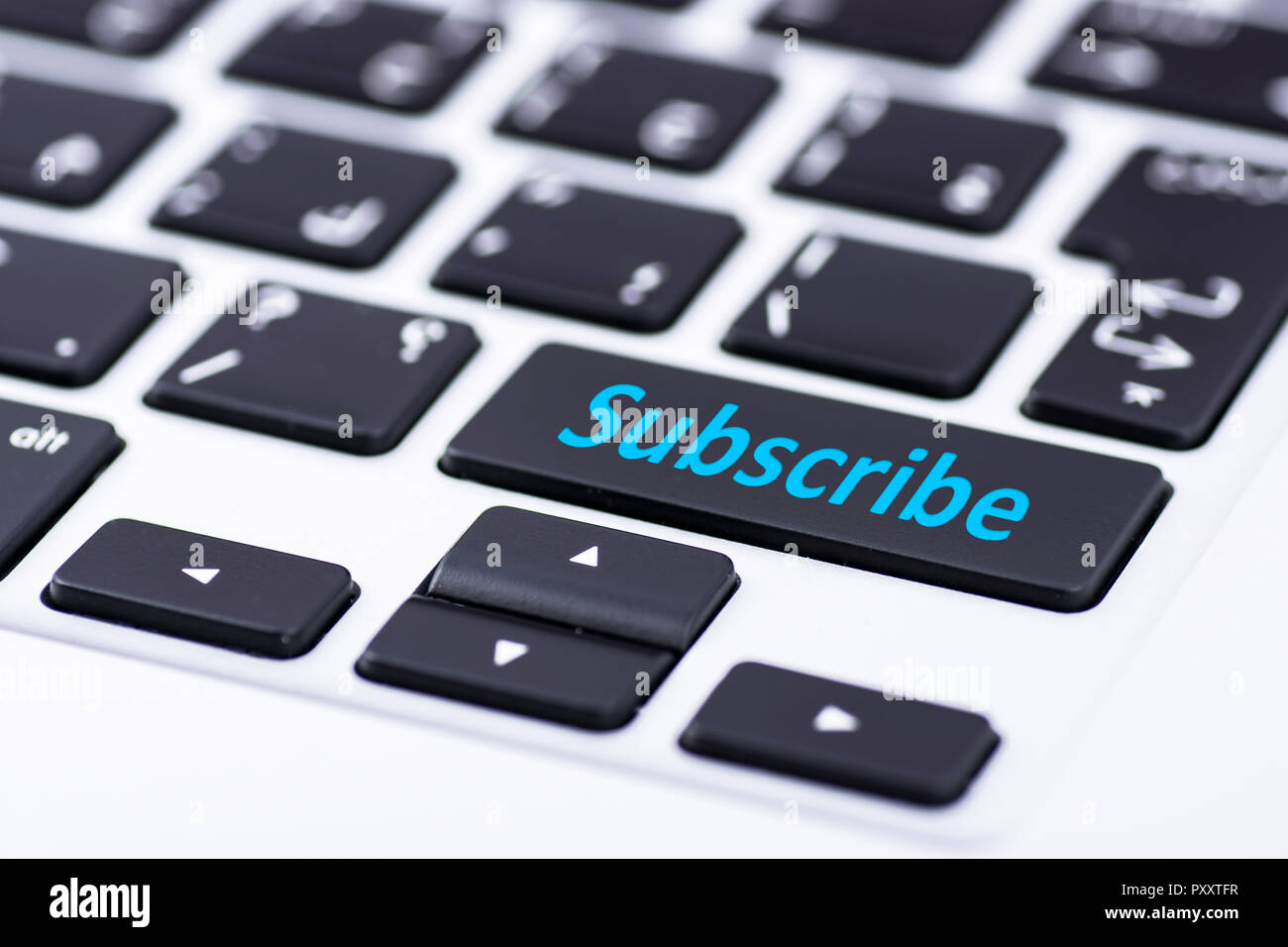 Subscribe on keyboard button Stock Photo