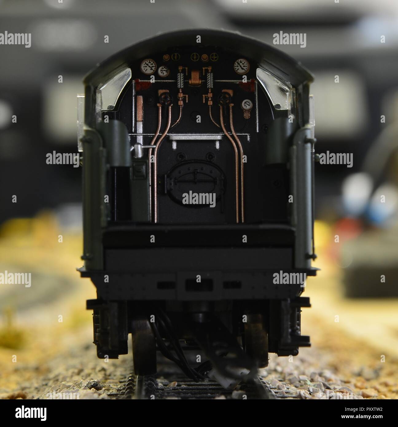 The dials inside the footplate of a modern toy train in 00 scale Stock Photo