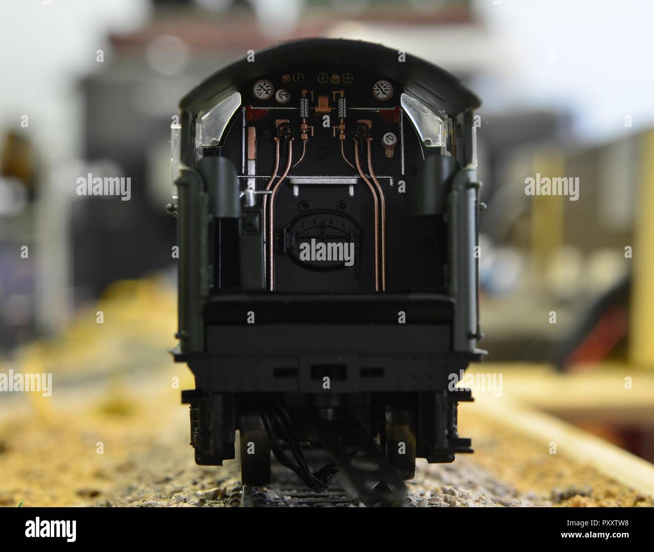 The dials inside the footplate of a modern toy train in 00 scale Stock Photo