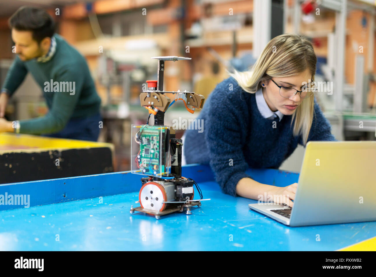 Young woman engineer working on robotics project Stock Photo Alamy