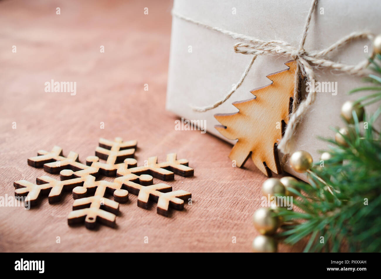 Gift Box Wrapped In Plain Brown Paper Tied With String With