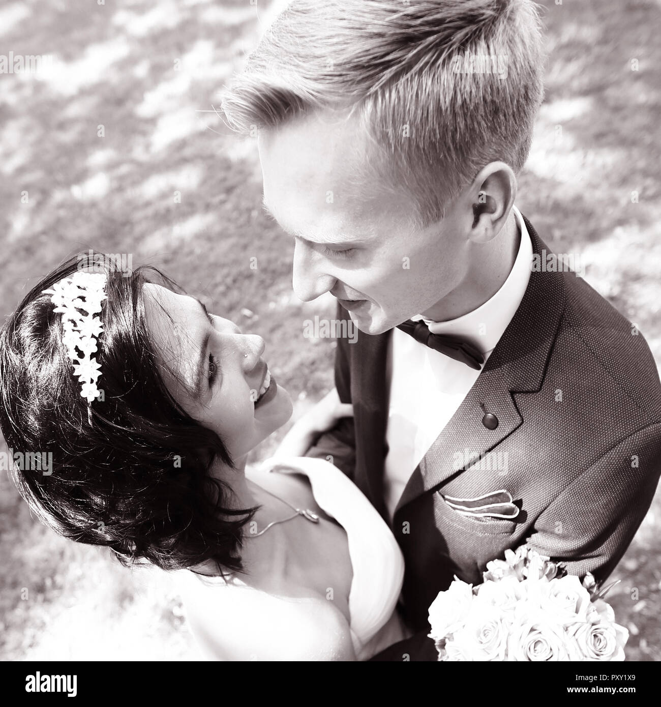 photo in retro style. happy bride and groom Stock Photo - Alamy