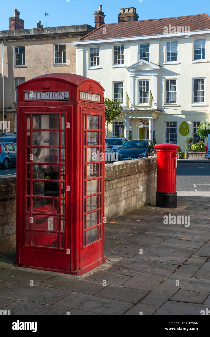 Red Telephone Box, Kiosk No. 6 together with red pillar box in St John's Street Devizes, Wiltshire, UK. Stock Photo