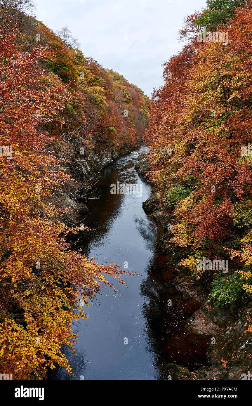 View from the green footbridge over the River Gary, towards the north, in autumn, Perthshire, Scotland. Stock Photo
