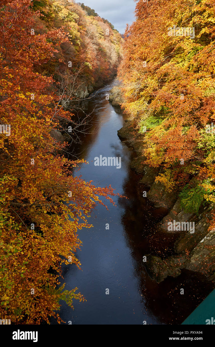 View from the green footbridge over the River Gary, towards the north, in autumn, Scotland. Stock Photo