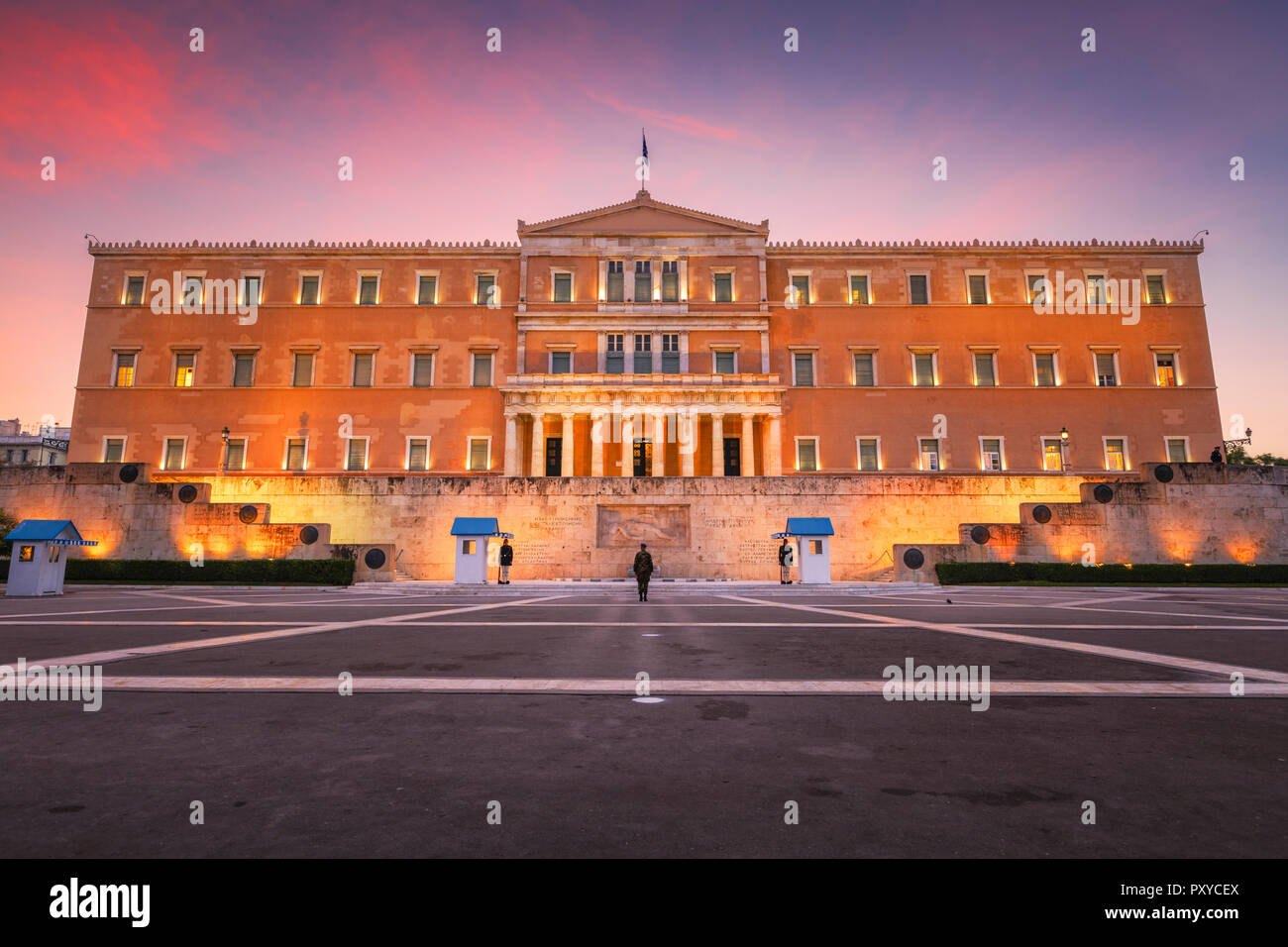Athens, Greece - October 24, 2018: Building of the Greek parliament in Syntagma square in central Athens at sunrise. Stock Photo