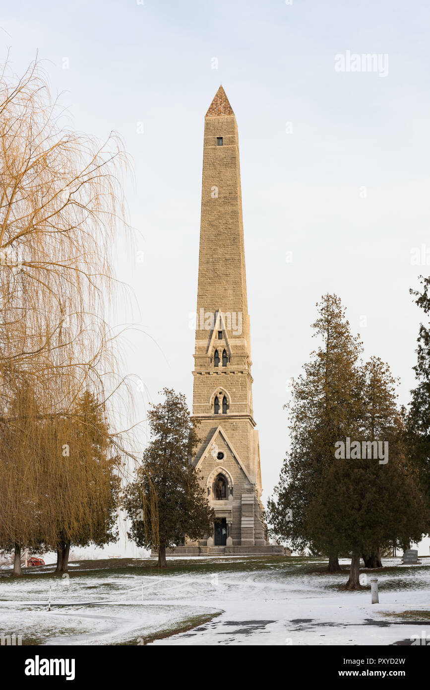 Obelisk monument on snowy winter day at Saratoga National Historical Park in New York. Stock Photo